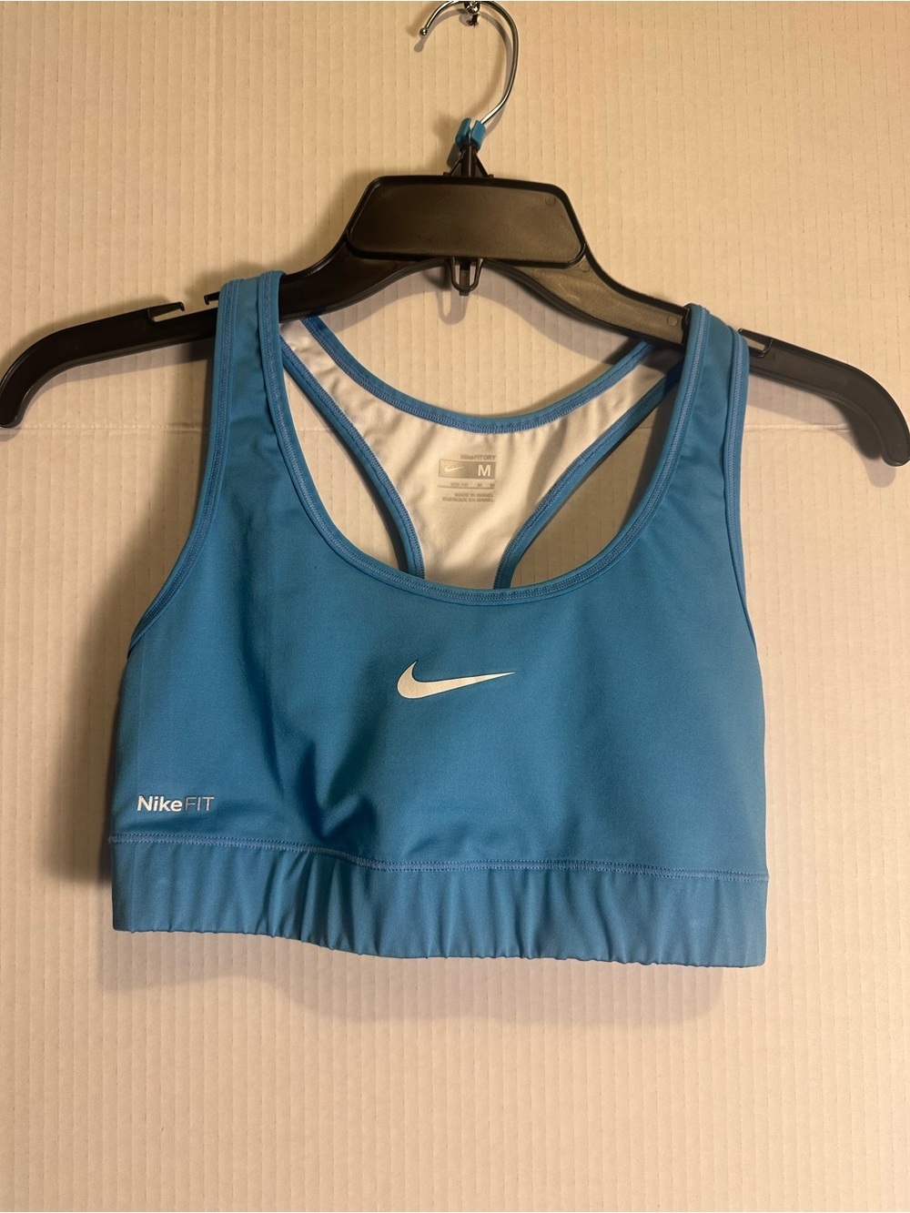 Nike Blue Racerback Sports Bra with White Swoosh - Medium Support